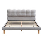 Lit plateforme tapissier Queen Size avec tête de lit en forme de biscuit