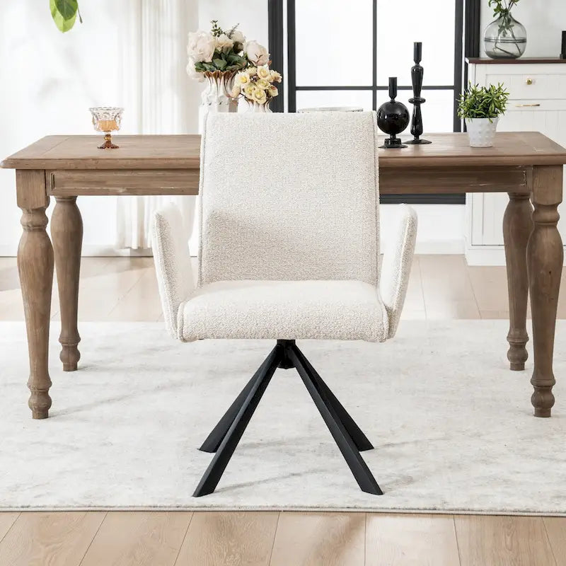 Fauteuil pivotant rembourré avec dossier haut et accoudoirs ouverts