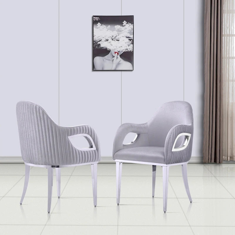 Chaise de salle à manger en velours avec accoudoirs en métal et pieds en acier inoxydable