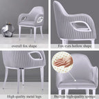 Chaise de salle à manger en velours avec accoudoirs en métal et pieds en acier inoxydable